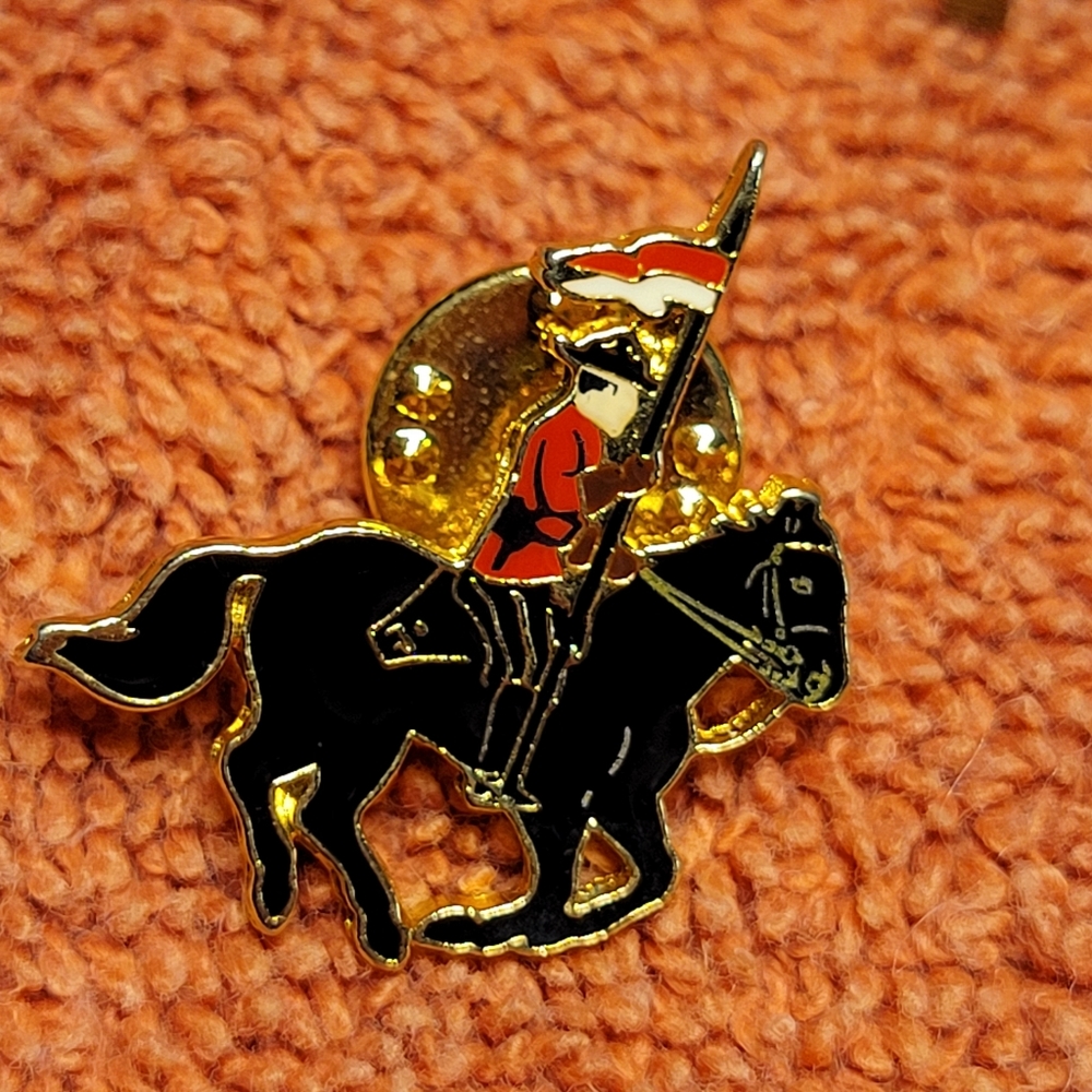 RCMP anniversary lapel pin in excellent condition , signed